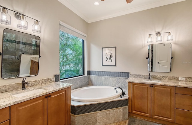 bathroom featuring ceiling fan, vanity, crown molding, and separate shower and tub