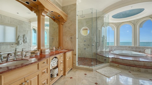 bathroom featuring a water view, vanity, separate shower and tub, and ornamental molding