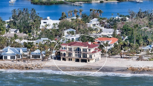 drone / aerial view with a water view