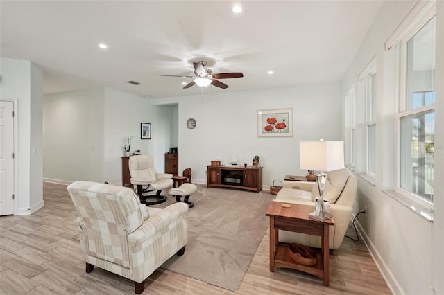 living room featuring ceiling fan