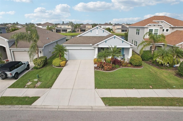 view of front facade featuring a garage and a front lawn