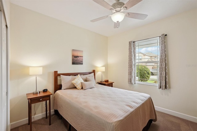 carpeted bedroom featuring ceiling fan