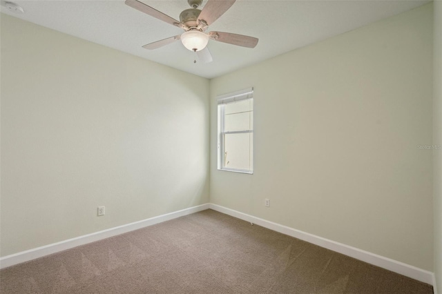 unfurnished room featuring carpet and ceiling fan