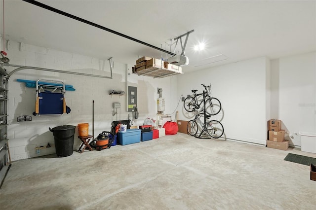 garage featuring electric panel and a garage door opener