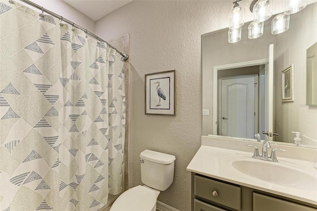 bathroom featuring a shower with shower curtain, vanity, and toilet