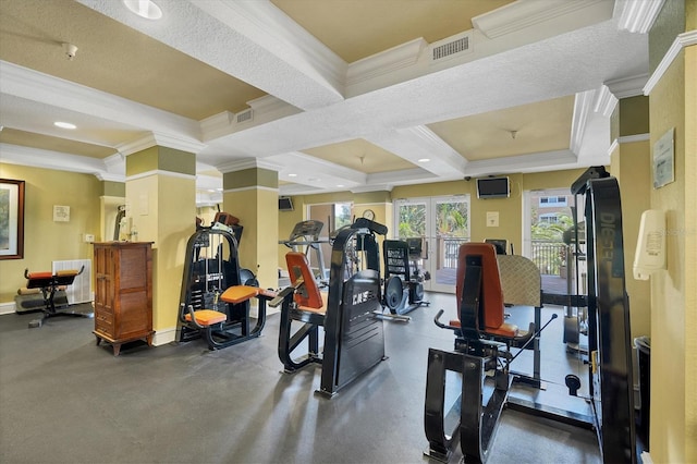 workout area featuring crown molding and coffered ceiling