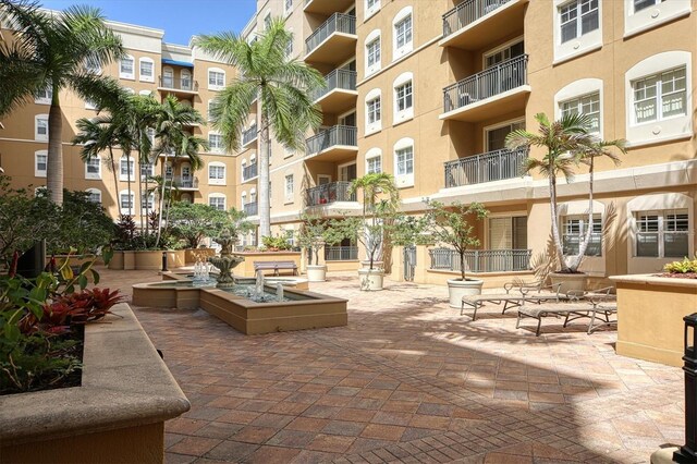 view of community with a patio area