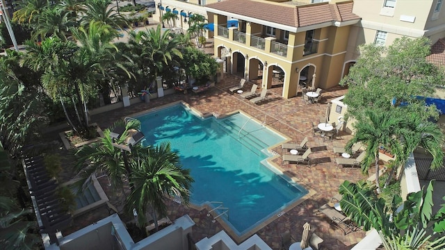 view of pool featuring a patio