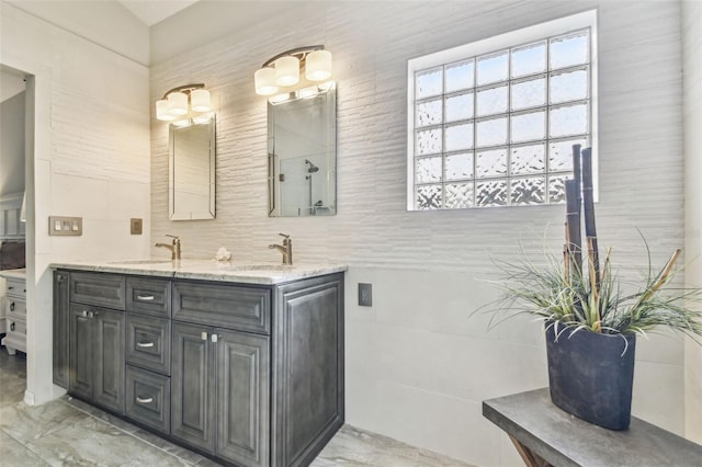 bathroom with tasteful backsplash and vanity