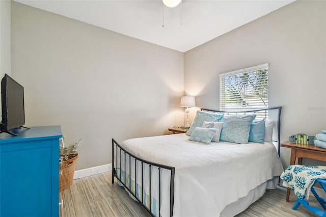 bedroom with light hardwood / wood-style floors