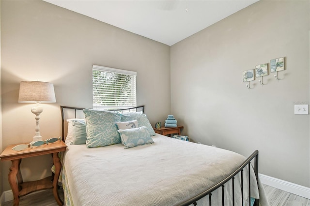 bedroom with light wood-type flooring