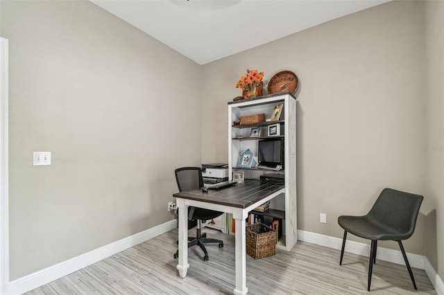 home office featuring light hardwood / wood-style floors