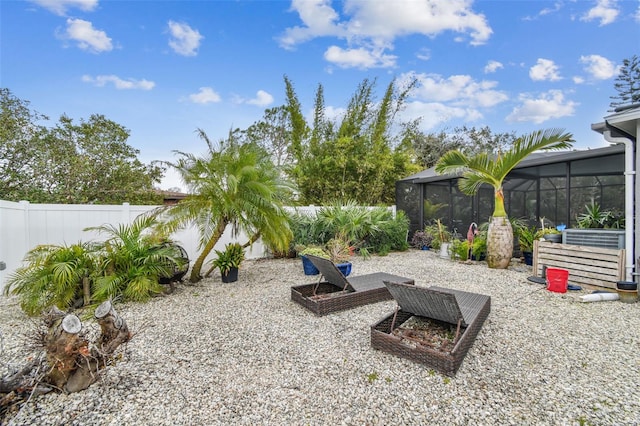 view of yard with a lanai and a patio area