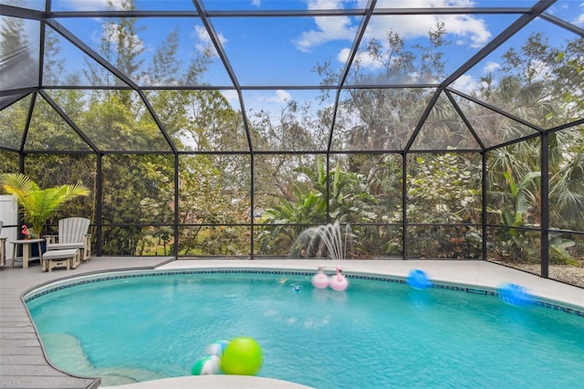 view of pool featuring a lanai