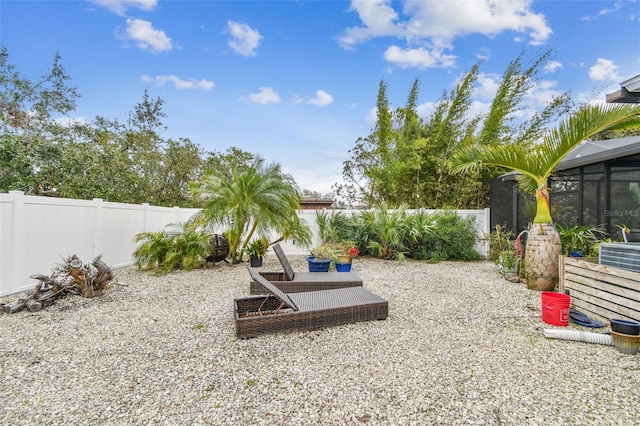 view of yard with a lanai and a patio