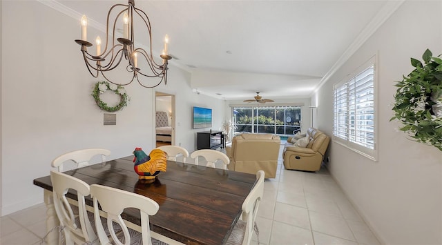 tiled dining space featuring ceiling fan with notable chandelier and ornamental molding