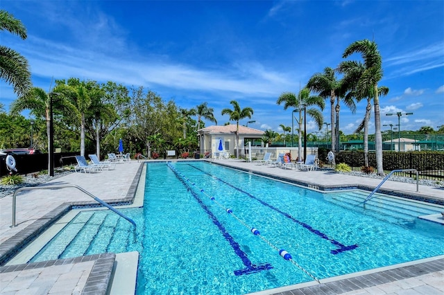 view of pool featuring a patio area