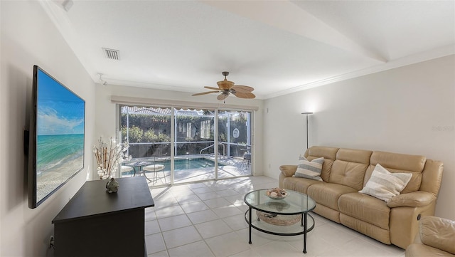 7575 Quinto Dr, Sarasota, FL 34238 - living room featuring light tile patterned floors, ornamental molding, and ceiling fan