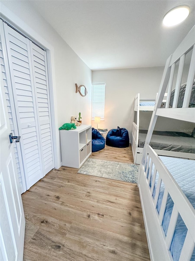 bedroom featuring wood-type flooring