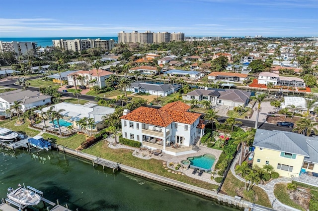 bird's eye view with a water view