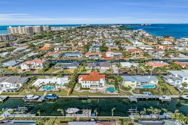 bird's eye view with a water view