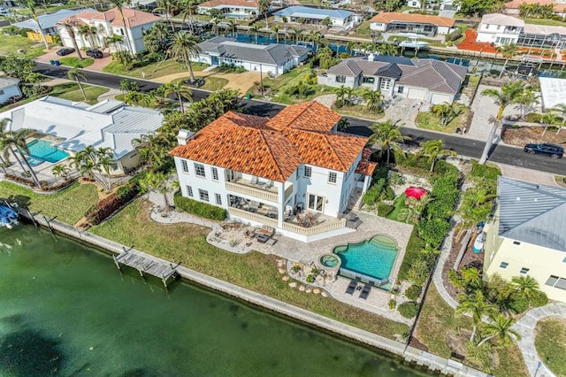 bird's eye view with a water view