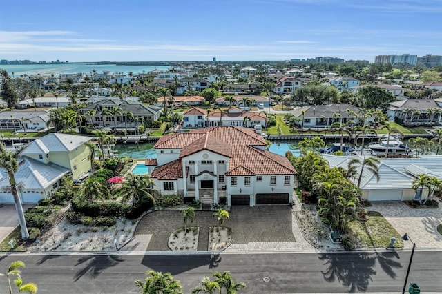 aerial view featuring a water view and a residential view
