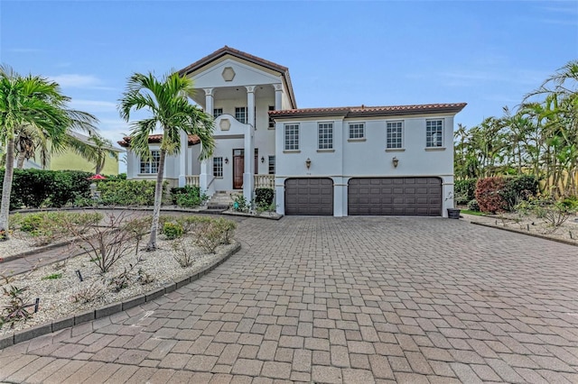 view of front of property with a garage