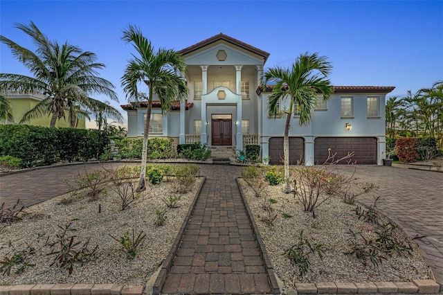 view of front of property featuring a garage