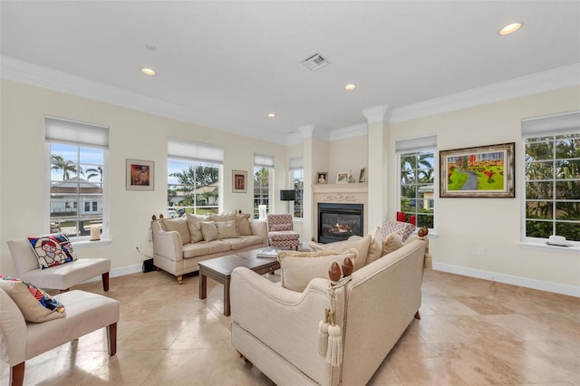 living room featuring crown molding