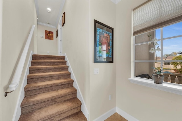 stairs featuring ornamental molding