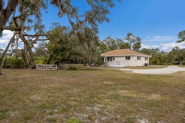 view of yard featuring covered porch