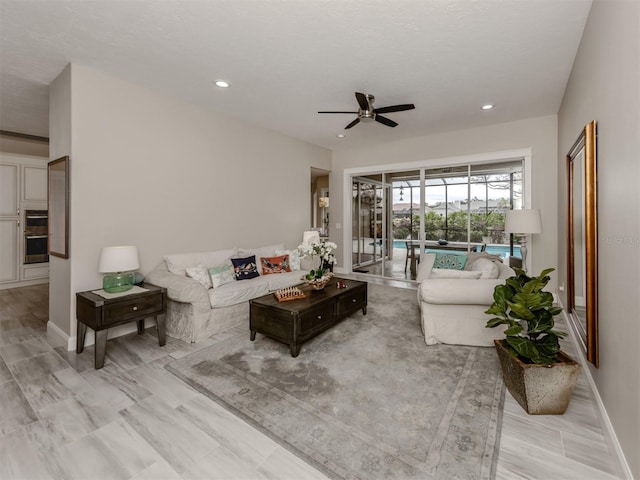 living room with ceiling fan