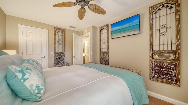 carpeted bedroom with ceiling fan