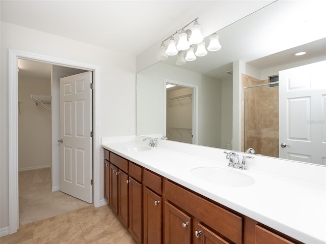 bathroom featuring walk in shower and vanity