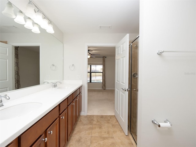 bathroom with vanity and walk in shower