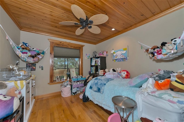 bedroom featuring ceiling fan, wooden ceiling, light hardwood / wood-style flooring, and crown molding