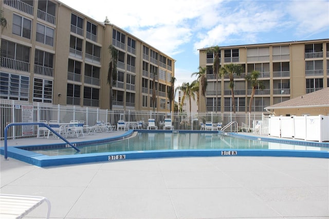 view of pool featuring a patio area