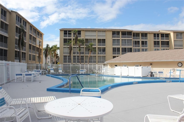 view of pool featuring a patio