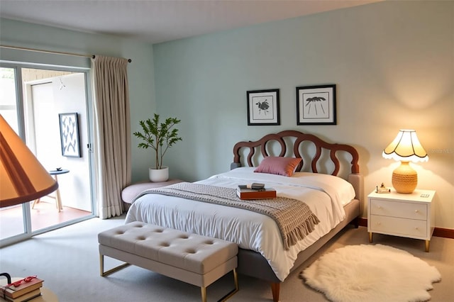 3682 Lake Bayshore Dr Unit K402, Bradenton, FL 34205 - carpeted bedroom featuring access to outside