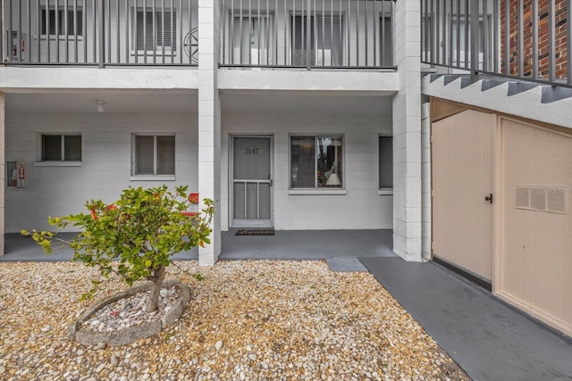 doorway to property featuring a balcony