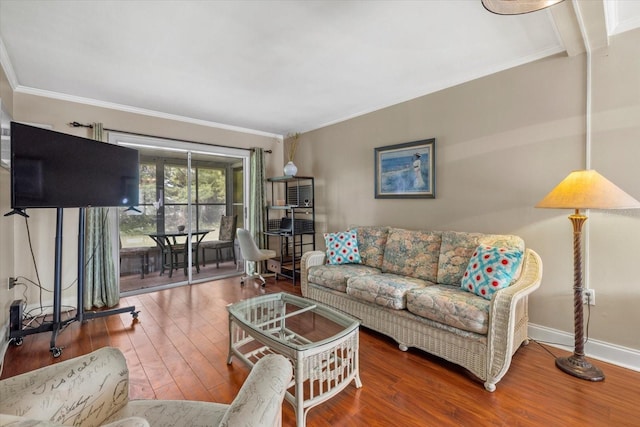 living room with ornamental molding and hardwood / wood-style floors