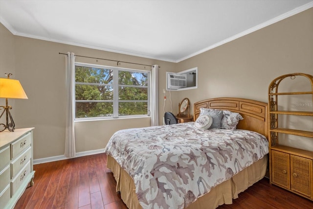 bedroom with ornamental molding, a wall unit AC, and dark hardwood / wood-style floors