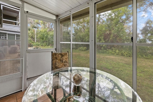 sunroom / solarium with a healthy amount of sunlight