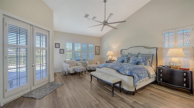 bedroom with high vaulted ceiling, light wood-type flooring, access to exterior, and ceiling fan