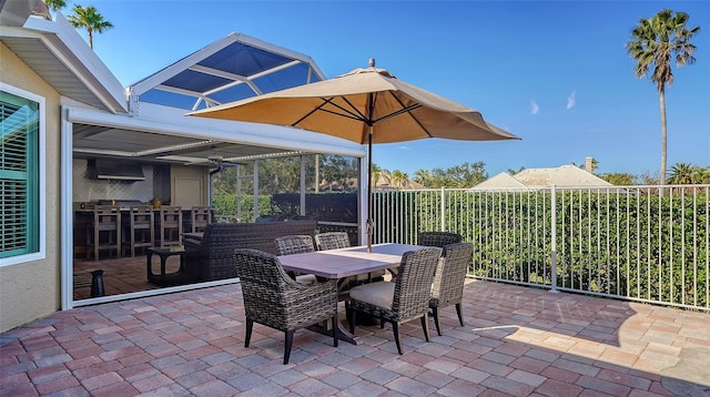 view of patio / terrace featuring ceiling fan