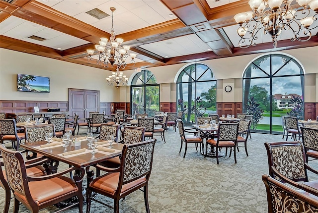 carpeted dining area with coffered ceiling, a notable chandelier, and beam ceiling