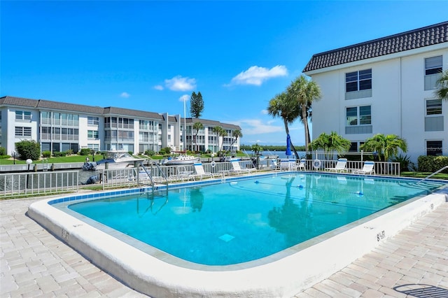 view of swimming pool featuring a patio