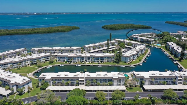 birds eye view of property featuring a water view