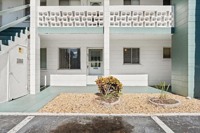 property entrance with a balcony